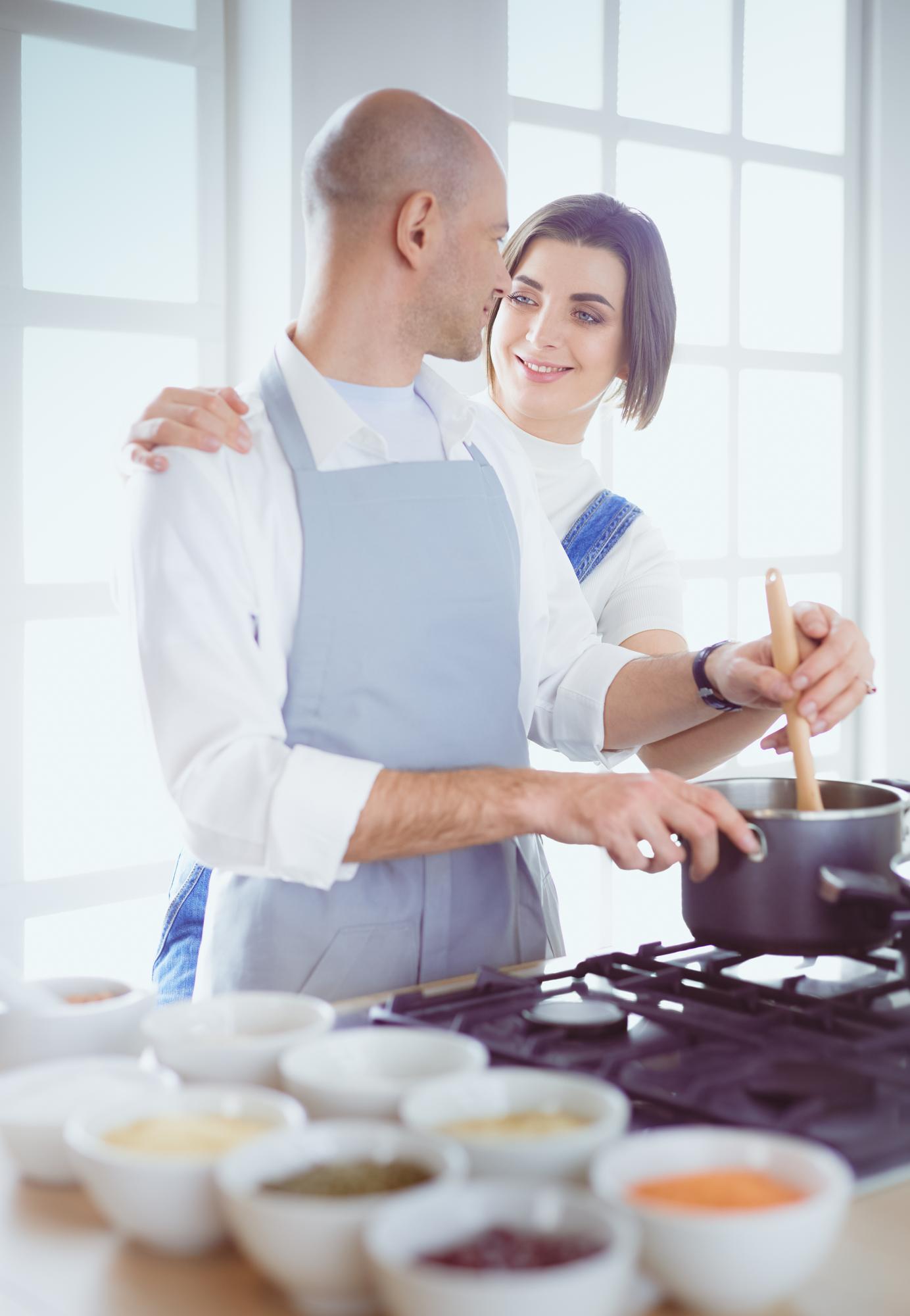 Studio kitchen with chef coaching a student